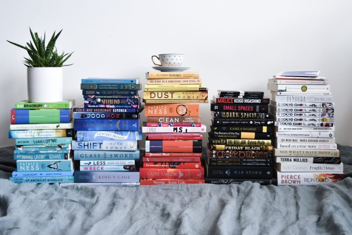 Stacks of books organised by colour