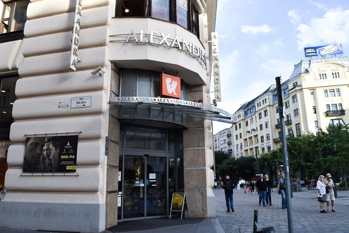 Entrance to the Alexandra bookstore on a rounded corner of a building.