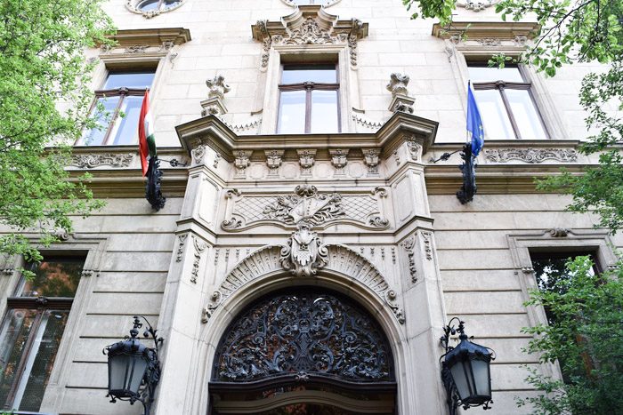 The entrance to the Metropolitan library, which is quite ornate with gothic carvings and adorned with two wrought-iron lamps.