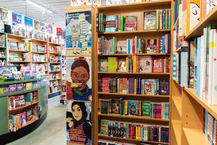 Picture of the inside of Lorne Beach Books, showing a shelf with middle grade and YA books.