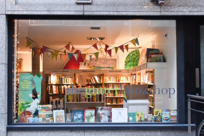 Window display of The Gutter Bookshop which displays a range of children's books