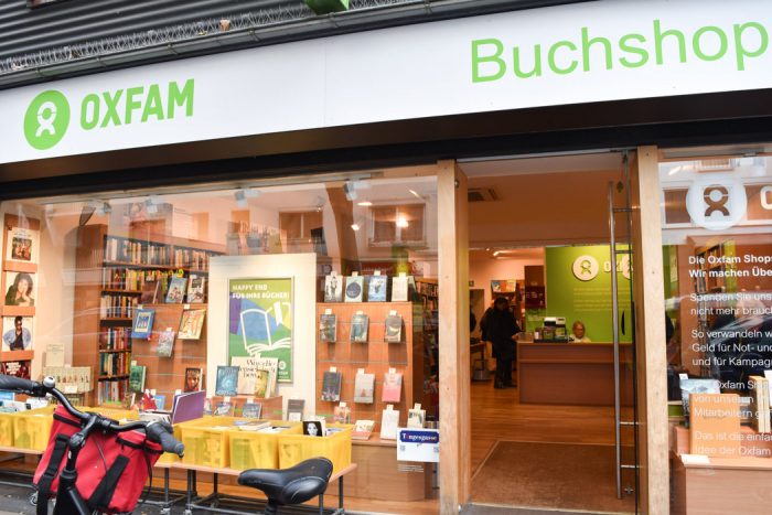 Exterior of Oxfam bookshop in Frankfurt showing a window display with a number of books for sale