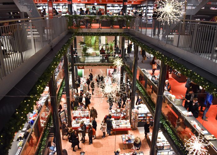 The atrium of this bookshop, which has three storeys visible.