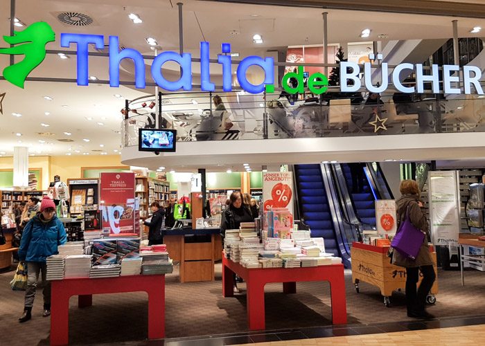 Front entrance to Thalia bookshop, with escalators leading to the next floor.