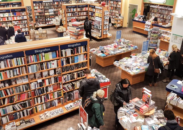 High angle shot of Thalia bookshop, which shows a number of people browsing the large amount of bookshelves