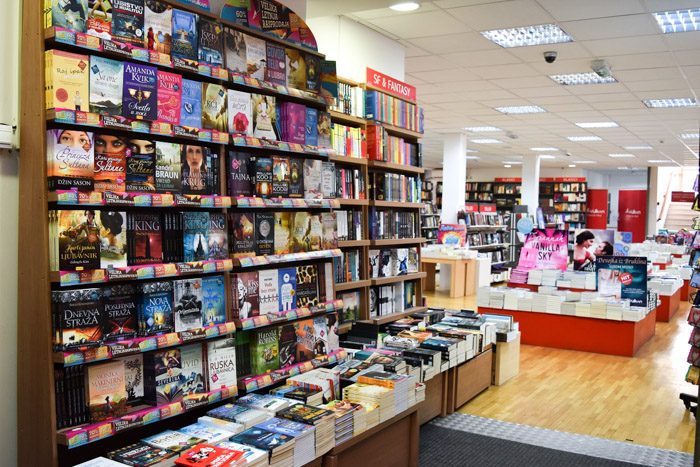 Interior of Vulkan Book Store Chain. Large bookshelves are stacked with books. Book Lover's Guide to Belgrade, Serbia.